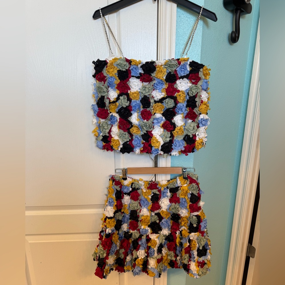 Queen of Sparkles colorful flower top and mini skirt with rhinestone straps.
